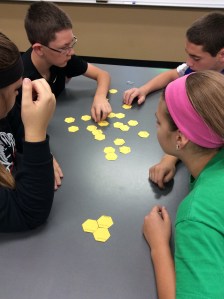 Students in Ms. Green's class using hexagons to refresh their memories and make connections to the curriculum. 